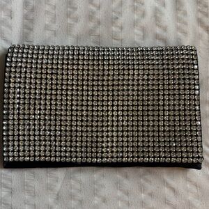 Chic Silver and Black Women's Clutch with silver chain strap.